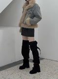 Fur trimmed quilted denim jacket