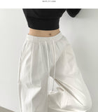 Nanspan banding pin tuck back cut mega wide pants