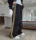 Solid track line two way training pants