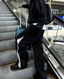 Oblique side zipper nylon pants