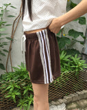 Arch track lace banding shorts short pants