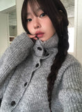 Juke diagonal button high neck knit