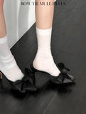 Bow tie mule heels