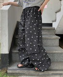 Meltz string banding flower parachute nylon pants