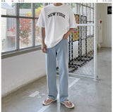 Half-bending semi-wide denim pants