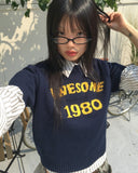 Tand 1980 Layered Cropped Short-Sleeved Knitwear