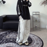 Rize side button track pants