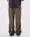 Out string glossy banding pants