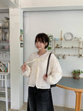 Ryoku Flower Punching Round Ribbon Cardigan