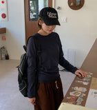 Clintel Layered Over Long-Sleeved T-Shirt