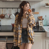 Bribe printed over checkered shirt
