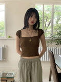Kundi back slit strap boucle short sleeve knit