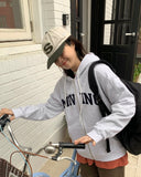 Ketini lettering over hood zip-up