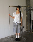 Etched puff ribbon pin tuck blouse
