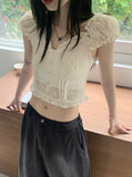 Illum Embroidery Punching Slit Cropped Short Sleeve Blouse