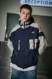 Magazine Hood Windbreaker