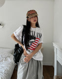 Land semi-crop over short sleeves