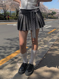 Chete Knot Check Pleats Mini Skirt