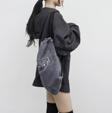 LINE denim string backpack