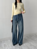 Slit semi-bootcut denim pants
