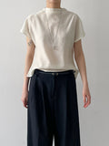 Pleated Mock Neck Cap Sleeve Blouse