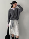 Raccoon V-neck loose-fit knit