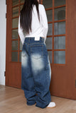 tin brush over denim