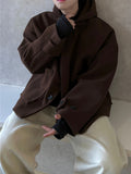 Norton over hooded coat