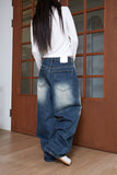 tin brush over denim