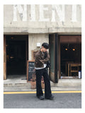 Bones black embo flare denim pants