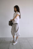 WRAP BUTTON CAP SLEEVE BLOUSE