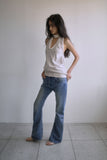 TWISTED BOOTS CUT DENIM JEANS