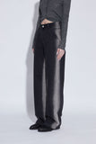 side washing black jeans