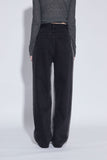 side washing black jeans