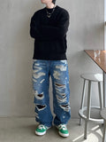 Destroyed washing latex denim