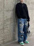 Destroyed washing latex denim