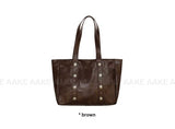 GLOSSY STUD SHOPPER BAG