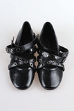 Punching stud strap shoes