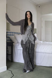String ribbon over pants