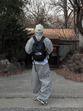 Calin diagonal cargo sweat balloon pants
