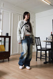 tin brush over denim