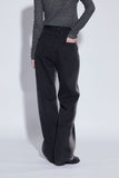 side washing black jeans
