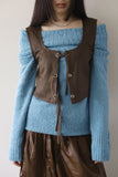 Et suede vest