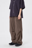 Out string glossy banding pants