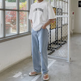 Half-bending semi-wide denim pants