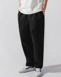 Deep tuck loose fit tapered banding pants