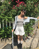 Ate frill punching see-through cardigan