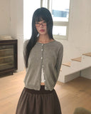 Nilla cut-out round neck button long-sleeved cardigan