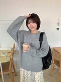 Kouni cable over round knit