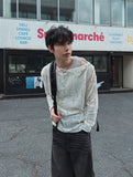Damage snap see-through knit
